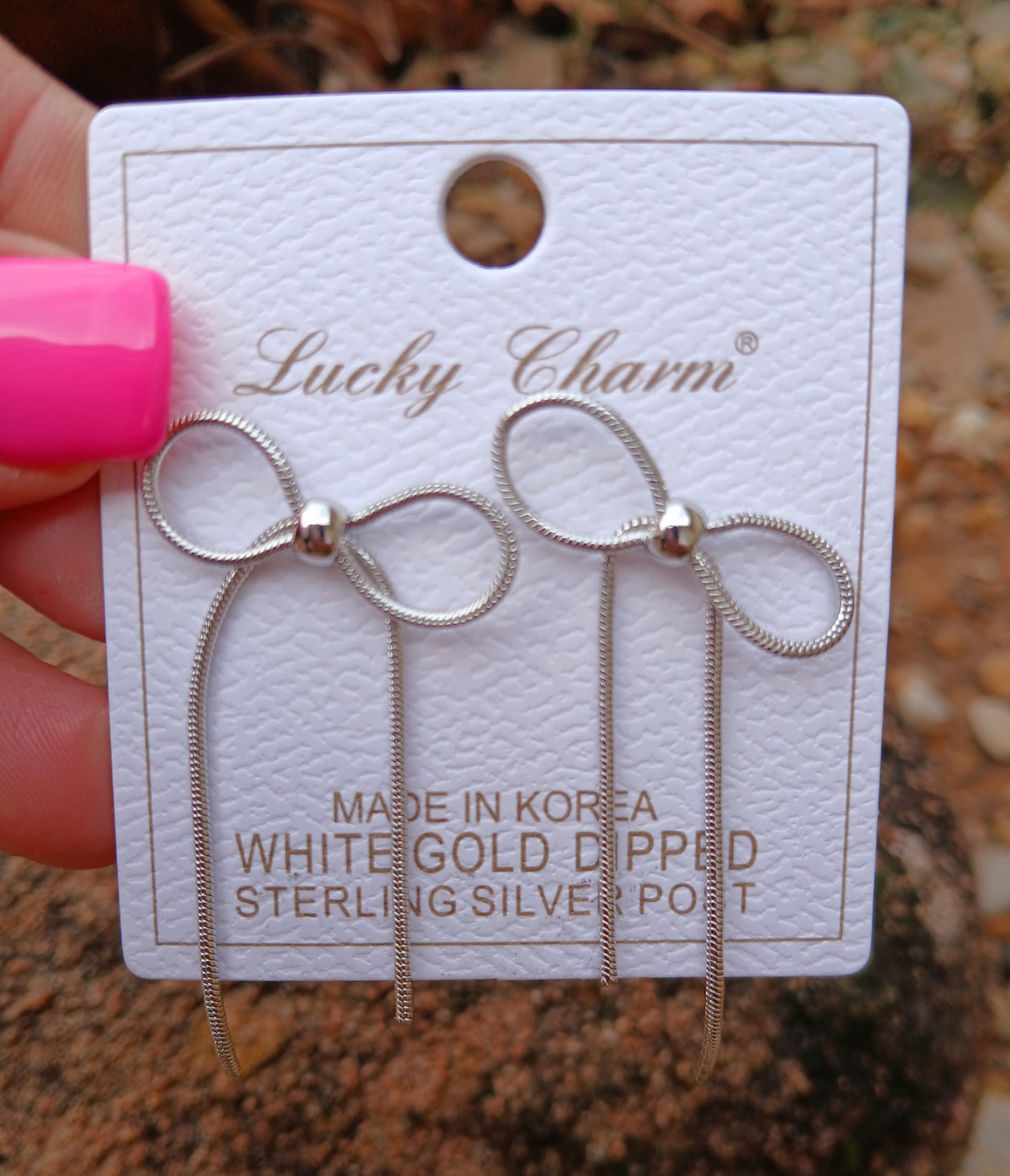 Silver post bow earrings
