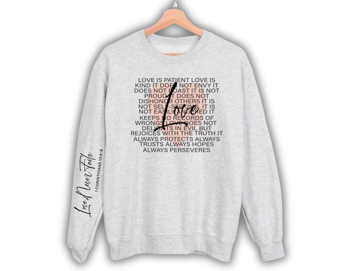 Love Never Fails Sweatshirt